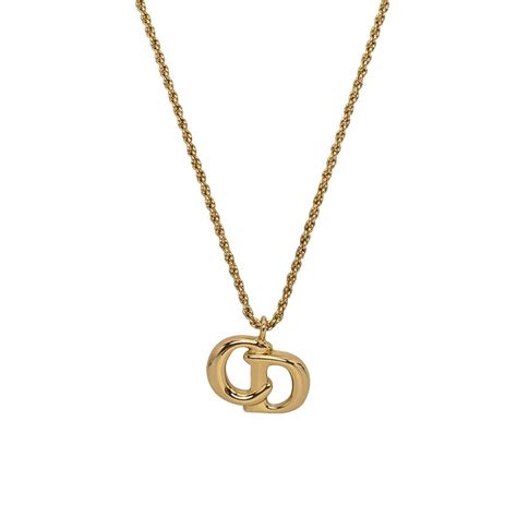 christian dior cd logo gold tone pendant chain necklace|Dior letters necklace value.